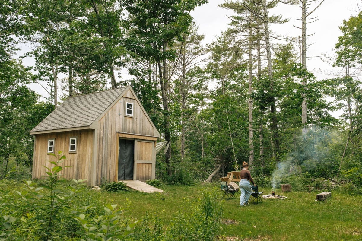 dream writers cabin in maine with barn doors and open concept